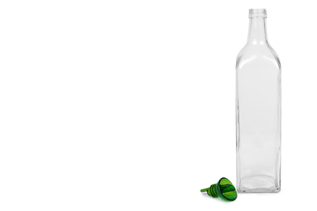 Empty transparent glass oil dispenser isolated on white background, copy space template.の写真素材