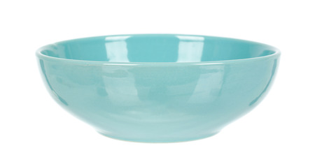 Blue empty ceramic bowl isolated on white background.の写真素材