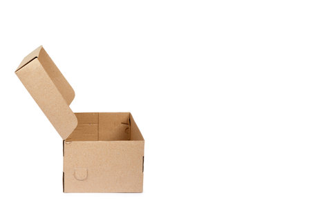 Brown cardboard box for packaging and delivery, isolated on white background, copy space template.