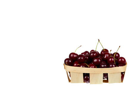 Sweet ripe cherry in package isolated on white background, copy space template