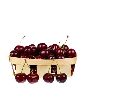 Sweet ripe cherry in package isolated on white background, copy space templateの写真素材