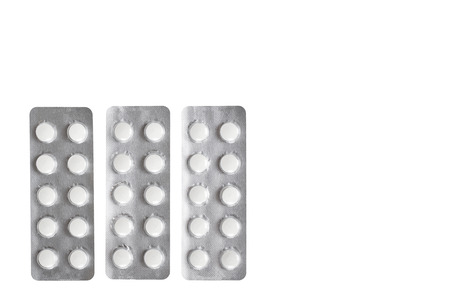 Silver blister packs pills isolated on white background, copy space template.の写真素材
