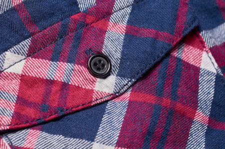 Macro photo of fabric pattern, close up of textile clothing with shallow depth of field. Soft...