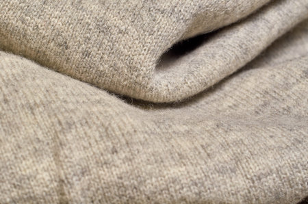 Macro photo of fabric pattern, close up of textile clothing with shallow depth of field. Soft...