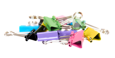 Color paper cilp, office accessory, fastener for notes. Isolated on white backgroundの写真素材