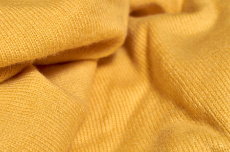 Macro photo of fabric pattern, close up of textile clothing with shallow depth of field. Soft...
