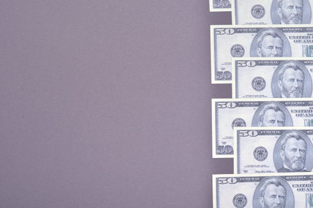 US dollars composition, minimal background. Flat lay and top view photoの写真素材