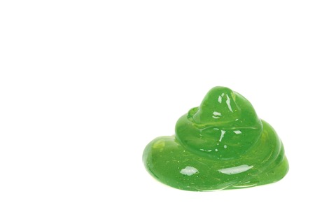 green slime for kids, transparent funny toy. Isolated on white background. Copy spaceの写真素材