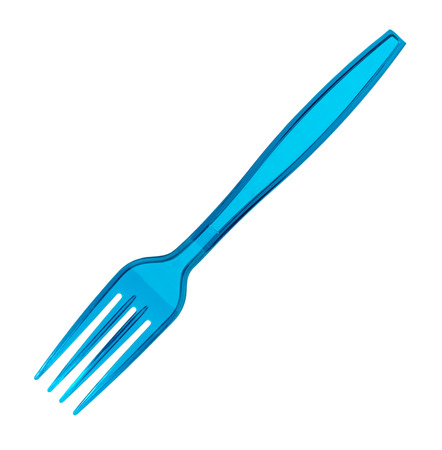 Blue plastic fork, disposable utensil. Isolated on white backgroundの写真素材