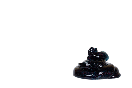 Black slime toy for kids, glitters and goo. Isolated on white background. Copy space templateの写真素材