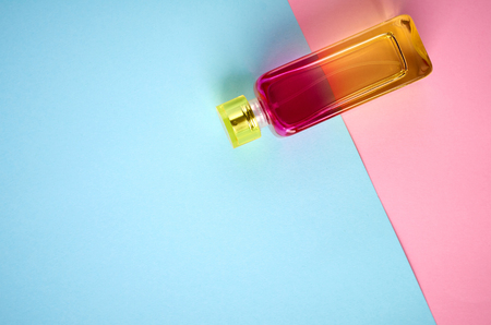 Glass perfume bottle composition, flat lay and top view photoの写真素材