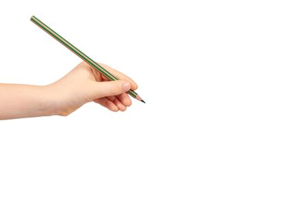 Kid hand holding color pencil, writing and drawing gesture. Isolated on white background. Copy space templateの写真素材