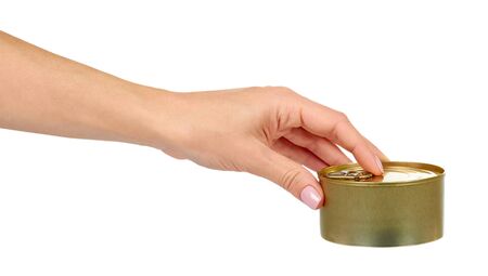 Hand with can. Canned prepared food with opener, conserved snack. Isolated on white background.の写真素材