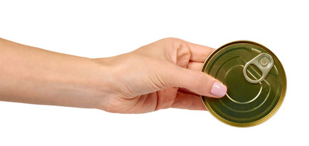Hand with can. Canned prepared food with opener, conserved snack. Isolated on white background.