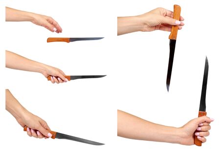 Hand with kitchen knives, wooden handle, set and collection. Isolated on white backgroundの写真素材