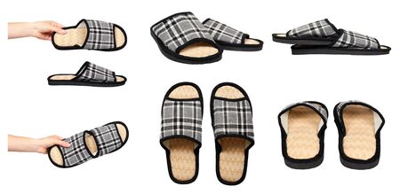 Hand with textile slippers, set and collection. Isolated on white background.の写真素材