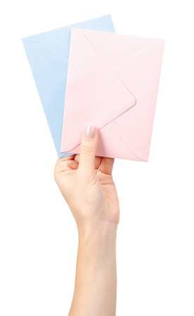 Hand with paper envelope for mail, letter for post. Isolated on white background.