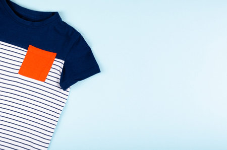 Textile, shirt composition on color background. Flat lay, layout and tabletop mockup with copy...