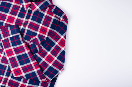 Textile, shirt composition on color background. Flat lay, layout and tabletop mockup with copy...