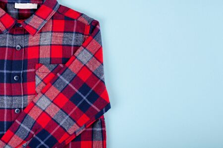 Textile, shirt composition on color background. Flat lay, layout and tabletop mockup with copy space.の写真素材