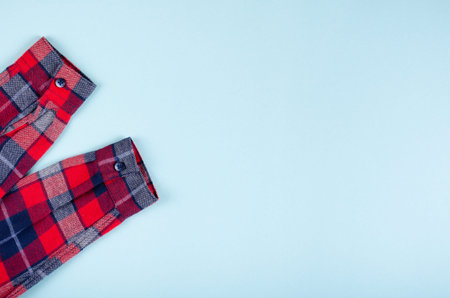 Textile, shirt composition on color background. Flat lay, layout and tabletop mockup with copy...