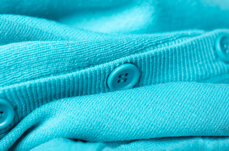 Turquoise textile and texture background. Fabric macro photography, cloth pattern.