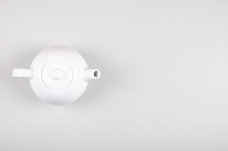 Tea pot composition on gray background. Flat lay, layout and tabletop mockup with copy space.の写真素材