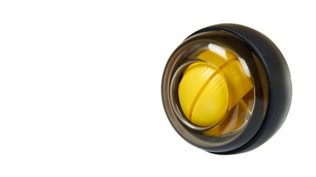 Yellow plastic gyroball. Exercise equipment for wrist. Sport tool. Isolated on white background....