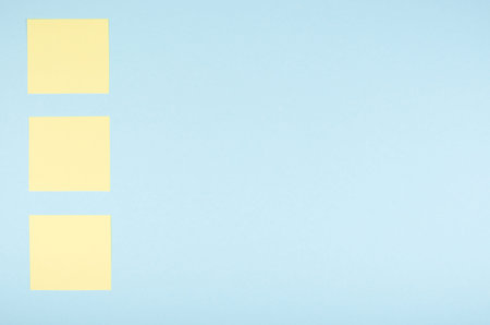 Paper notes composition on blue background. Flat lay, layout and tabletop mockup with copy space.