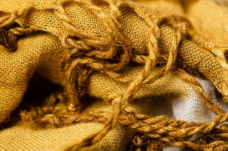 Yellow textile and texture background. Fabric macro photography, cloth pattern.の写真素材