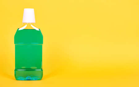 Green mouthwash bottle, dental health care.の写真素材