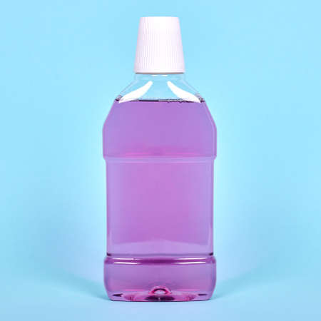 Purple mouthwash bottle, dental health care.の写真素材
