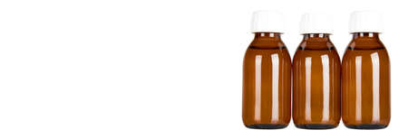Medical glass bottle, syrup. Isolated on white background.の写真素材