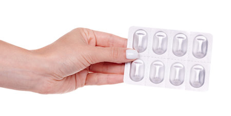 Medical pills in blister, isolated.