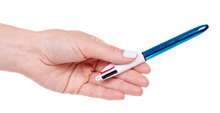 Glossy ballpoint pen, isolated on white.