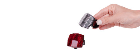 Red bicycle reflector for safety.