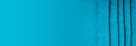 Blue towel fabric texture, top view photo, copy space background.