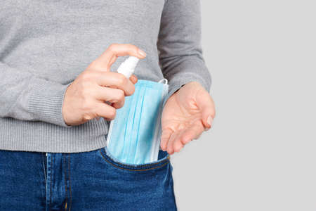 Medicine protective mask in jeans pocket.の写真素材
