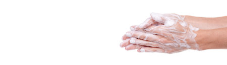 Washing hands with soap, foam on skin, isolated.