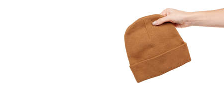 Brown wool winter hat isolated on white.の写真素材