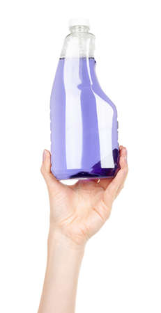 Hand with purple detergent for cleaning isolated on whiteの写真素材