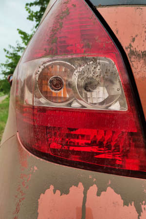 Dirty car tail lights, close up.の写真素材