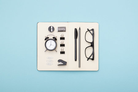 Set of office items lie on the table. Minimalistic set for work and study