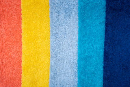 Composition of colored cotton towels. The concept of softness and purityの写真素材