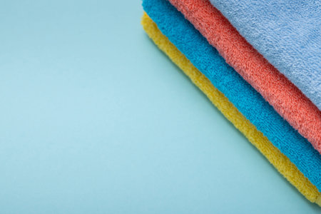 Composition of colored cotton towels. The concept of softness and purityの写真素材