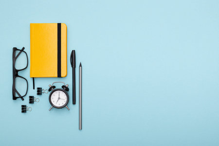 Set of office items lie on the table. Minimalistic set for work and study