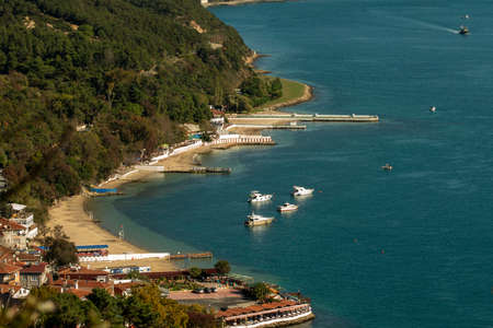 Pleasure boats moored on beaches near Sariyer, north of Istanbul, near the Black Sea in the Bosphorus Strait.の写真素材