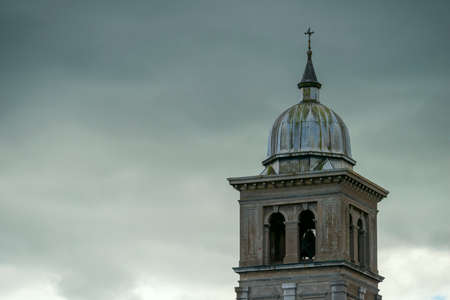 Tower and steeple roof of a church in Waterford south of the Republic of Irelandの写真素材