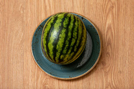 Delicious watermelon on blue porcelain plateの写真素材