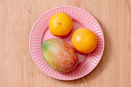 The mango is the name of the fruits of several species of trees of the genus Mangiferalanta and of the genus Citrus, of the family of Rutaceae, cultivated for its fruit, the grapefruit or grapefruitの写真素材